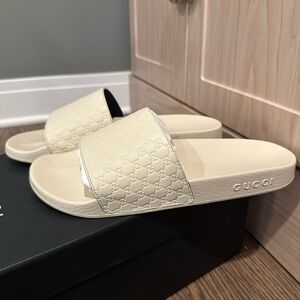 Gucci Cream Embossed GG Slide Sandals